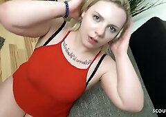 German curvy blonde Jessy gives passionate oral on the couch