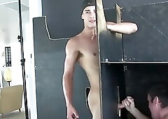 Straight chap gets his cock sucked through a glory hole