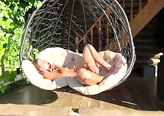 Blonde Fucks Her Didlo With A Big Rubber Dick On A Swing