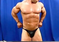 Tommy Wooster Lifting Weights And Flexing and Posing Backstage