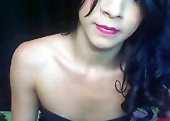 Attractive tranny jerks off and dildos her ass on webcam