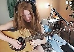 cute skinny tgirl play guitar for her fans