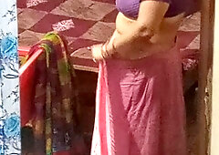 Aunty caught red handed on camera while changing dress.