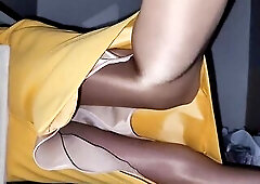 Looking up my Yellow silky lined office petticoat with a satin half slide and glossy hose.