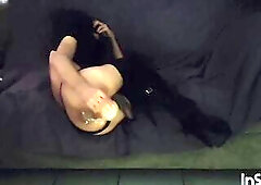 whore trembles with fun with her sex toy in her butt.