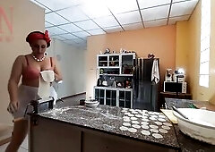 A bare housewife is preparing dinner in the kitchen. The dissolute whimsical housekeeper Brassiere 1