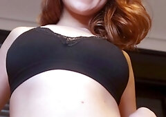 Busty redhead babe strips and masturbates