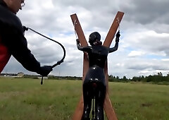 Chained And Used Latex Girl Outdoors