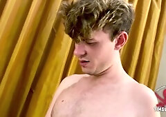 Curly-haired hottie sucks on a guy's hard cock