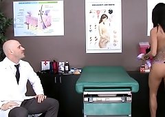 A hot raven haired girl gets her pussy examined at the doctors