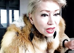 Aged Russian web camera floozy AimeeParadise in a furry coat blows smoke in face of her virtual serf!