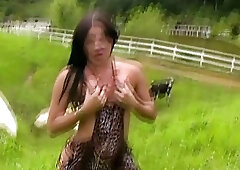 Flirty tranny in slinky leopard print dress shows huge ass