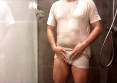 Amateur chubby guy Shycummerboy shows off a striptease in the shower wearing white briefs and a tee