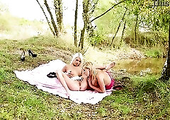 The relaxed stroll in the balmy outside atmosphere incited a lesbo allure between 'em.