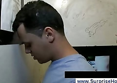 Boy jerks off on gays face through hole