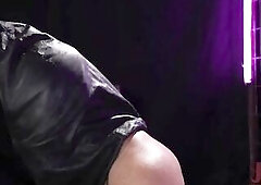 Standing in her dungeon wearing a sexy ebony latex corset with matching latex haunch-highs, Chelsea Marie is already in full swing, drubbing the back 