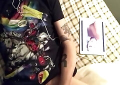 Hawt Grungy stud lays in couch and strokes his large thick Schlong and watches porn