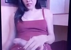 Anna fills her dress with milk.