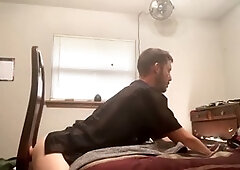 Tightly toned ass gets played with a hefty dildo