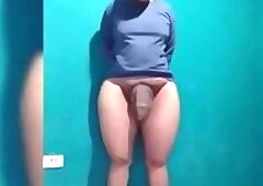 Young adult with a feminine body, a big butt, and a large penis.