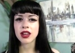 Tattooed, black haired chick likes wearing latex costumes wile getting fucked by a black guy