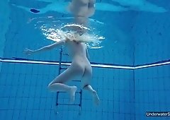 Light haired beautiful naked chick and her amateur solo underwater show