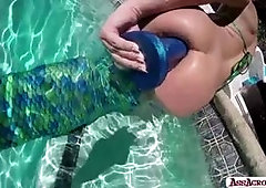 Gorgeous brunette babe Adriana Chechik cavorts in the pool wearing amermald costume and a giant fish tail. We go underwater, where she pushes huge bal