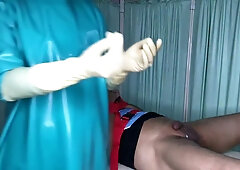 Dental patient restrained on exam table receives handjob from masked dentist