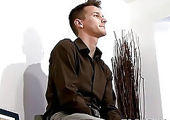 Young man strips to reveal his giant cock before jerking off