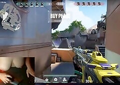 Gamer girl playing with big boobs while playing video game