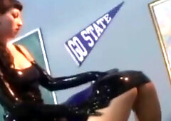 Girl's latex suit scene by Latex Pussycats