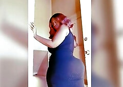 Flirty Black big beautiful woman in ebony suit