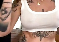 Inked Babe Teases in Topless Cam