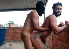 2 men having super hot hook-up outdoors.