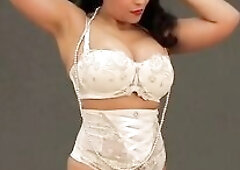 See Danica Collins tease and please in this classic underware striptease movie scene. Set to music that babe lazily disrobes, releasing her giant natu