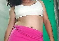 Trans girl in pink miniskirt masturbating.