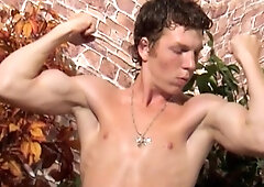 Gavril shows his muscles and plays with his dick