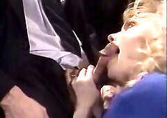 Breasty blond sweetheart gets double permeated in an office by her dude collegues