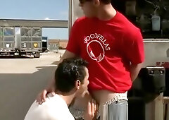 Gay guy gives a blowjob in public