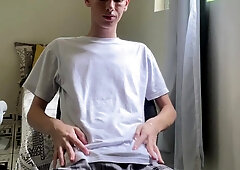 Youngster demonstrating his figure in his lil' speedo