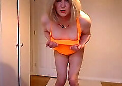 Cute orange party dress, nude pantyhose and high heels