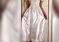 Trying on my vintage satin wedding costume with a skirt and glossy hose.