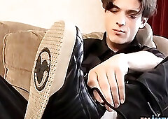 Attractive twink teases with his toes while stroking his schlong