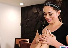 Sophia Burns helps her busty wife Little Puck with her sore shoulders.The latin milf enjoys a foot and boob massage and it leads to pussy licking