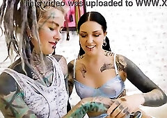 Tattooed Angel Takes Full Fist in Snatch and Butt