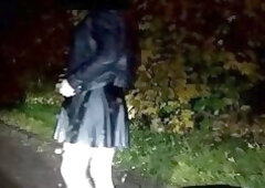 Crossdresser show her erection. Public masturbation in boots and pantyhose