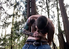 Big-dicked hunk Jake Hart jerking off in the woods