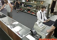 Straight guy sucks pawnbroker behind counter
