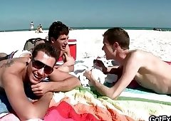 Hot gay threesome having fun under shower