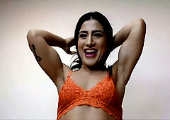 Amateur Latina in orange lace bra flaunts her big ass and tits on the couch